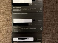 Slightly thicker digits on the back. Top card is the newer replacement 