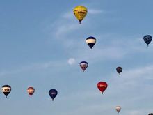 60 Balloons this year. I just thought the moon and balloons together was a great pic!