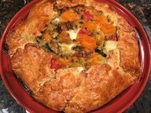 Cherry tomato, zucchini and mozzarella pie. 