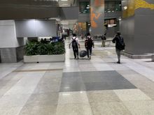 Had to exit the airport completely to city side and take escalator upstairs to walk to pillar 8. 