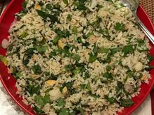 A Peranakan specialty - nasi ulam - rice salad with bits of fish and various herbs . Lovingly prepared by another guy friend .