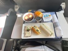 The scone was warm and delicious with cream and jam washed down with a tea