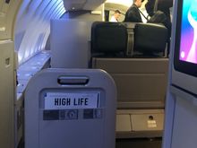 The mini-bulkhead in front of 63J/K, also taken from 62K. You get some idea of the space between rows 62/63. 