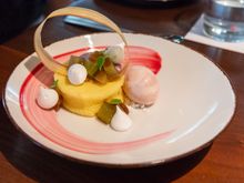 Dessert #1: Meyer lemon castella served with hibiscus ganache, cherry blossom frozen yogurt, and rhubarb. This was pretty decent, with the textures working well together (including the dense sponge cake with the rhubarb and with the merengues), and the flavors were nice. 