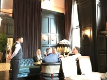 Staff taking wine social hour drink orders