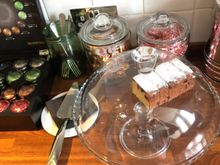 Cake and biscuits with coffee/tea in pantry on each floor.