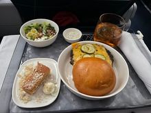 Atlanta - Mexico City: Hamburger was actually great and for some reason didn't show up in the preorder email but only showed in the DL app selection menu. I do wish that they would add the pickles in after they heat the burger as they become a little wilted in the oven. Salad was also fantastic. I was really happy with this for a relatively short flight.