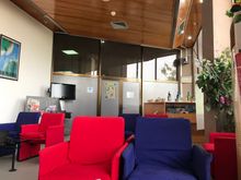 Bar area with snacks, beverages, and newspapers
