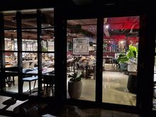 Outside view of the restaurant, with seasonal outside seating.