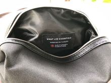 Lined inside of bag with tag.