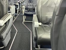 View of aisle from J to Y. On the 9J version seat 4B is missing. 
