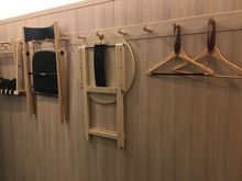 No closet in the room. Clothes and furniture gets hung on the wall, like in a business hotel. 