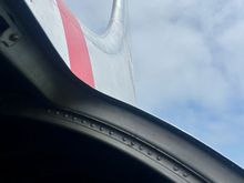 View out of one of the hatches that was open during the flight; too windy to stick your head out but it was possible to see the huge fin (vertical stabiliser). 