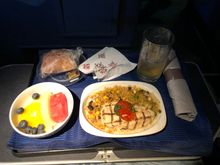 
Prior to my flight I received an email from United asking if I wanted to pre-order my meal. The options were chicken or Italian and that was it! And since my wife is Italian and I eat the best Italian food at home I opted for the chicken - which was dry and tasteless! The roll was so hard I couldn’t cut it in half      —— no really. After my first bite I knew why, it was incredibly dry so I passed.  Sadly the meal  was as expect for a domestic first class meal.
