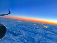 The sun actually rose in the west because of the time of year and route of the flight!