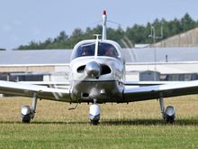 Piper PA28 Archer 2 - arriving into Lasham (QLA/EGHL). I am the person in the left of this photo, occupying the right hand seat; my flying buddy is Pilot In Command (PIC) for this flight. 