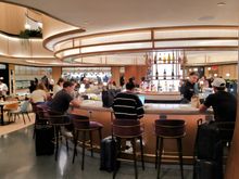 The circular bar in the Chase Sapphire lounge in La Guardia airport 