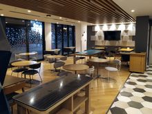 The breakfast area is beside the bar