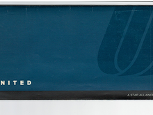 blue ticket jacket (Y) in the final pmUA sans-serif font logo (2000-2012)