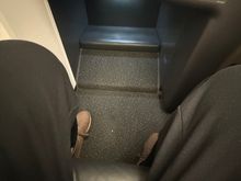 Spacious footwell on 1J.  My preferred seat as I do have size 13.5 feet 