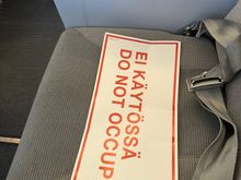Cabin crew sit here for takeoff and landing 
