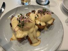 Pork Belly Benedict on grilled focaccia and yuzu hollandaise