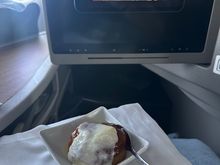 Apple cake with ice cream. Also had a cookie and espresso prior to arrival. 