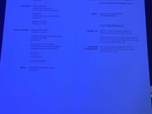 Apologies for the rather dark photo. This was the menu on BA174 from JFK to LHR today. The soup was ok if a little lukewarm. For the main I had the cod which was nice. Wife had the pasta which was apparently a bit bland. Son No.2 had the beef which was a little tough and son No. 1 had more gin! 

The mango pudding was quite nice though I still prefer cheese and biscuits. I could have had both but decided to sleep instead. Refused breakfast in favour of sleep. 