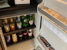 Stocked minibar operating with a movement sensor, touch it and pay 