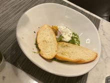 CrostOni covering up Burrata Caprese