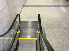 Down escalator