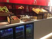 buffet area with fruit, yoghurt and pastries