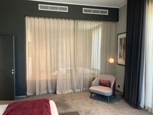 And from the bed end we see... a vitrage, what kind of visage lurks behind it ....