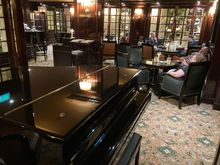 A piano is present, no idea if ambiant or karaoke participating 