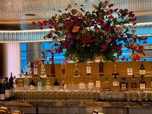 Main bar, beautiful flower center piece. 