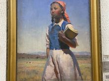 Under the Soviet Union education expanded in Kyrgyzstan. This painting is in honor of that and depicts a Kyrgyz girl getting an education. 