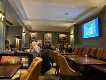 Seating area of the lounge , TV is set on local NYC news 
