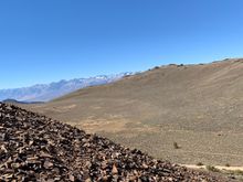 Rock scree on the trail. The signed explained why these were reddish while most of the mountains are white. Tough to walk on though. 