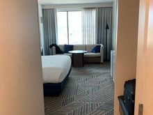 Room with couch and King bed 