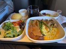 Starter: Herb ricotta cheese with baby beets, toasted pistachios and pineapple citrus vinaigrette

Salad: Baby red oak leaf arugula salad with shave parmesan, artichokes and roasted red tomatoes

Entree: Braised osso buco with savory braising jus, golden milanese risotto and char-grilled asparagus spears