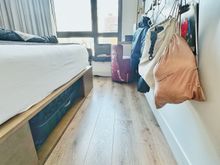 Full Size Samsonite hardside under bed.