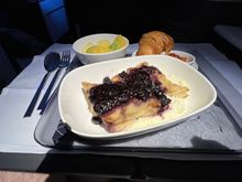 French toast bread pudding supported by croissant.   Didn’t touch the croissant.  Just a thought.  Replace the croissant with a yoghurt. 