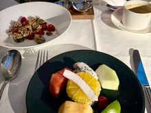 second meal before landing-  fruit plate and cereal 