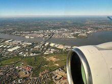 Dartford crossing; specifically, the Queen Elizabeth II bridge. I once flew a 2 seat Spitfire over this bridge about 1000 feet above and neatly dissecting the upright towers 