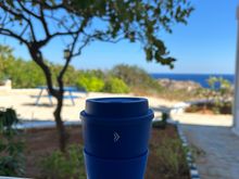 received one during my intra-Schengen ATH lounge visit https://en.wikipedia.org/wiki/International_Coffee_Day