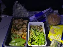 Dinner served after take off. Chicken in sweet soy sauce with soba noodles. (Other option was the veggie stir fry noodles)The new dessert was very tasty, but I still rather have the ice cream option. 