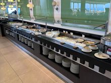 The breakfast offering was definitely sufficient. The big open room lacks ambience and is loud, but you do have a good view of the ocean. 