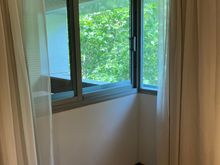 Window can be opened and comes with blackout curtains