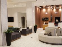 Check-in desk with front door to the right