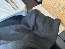 Black lap blanket.